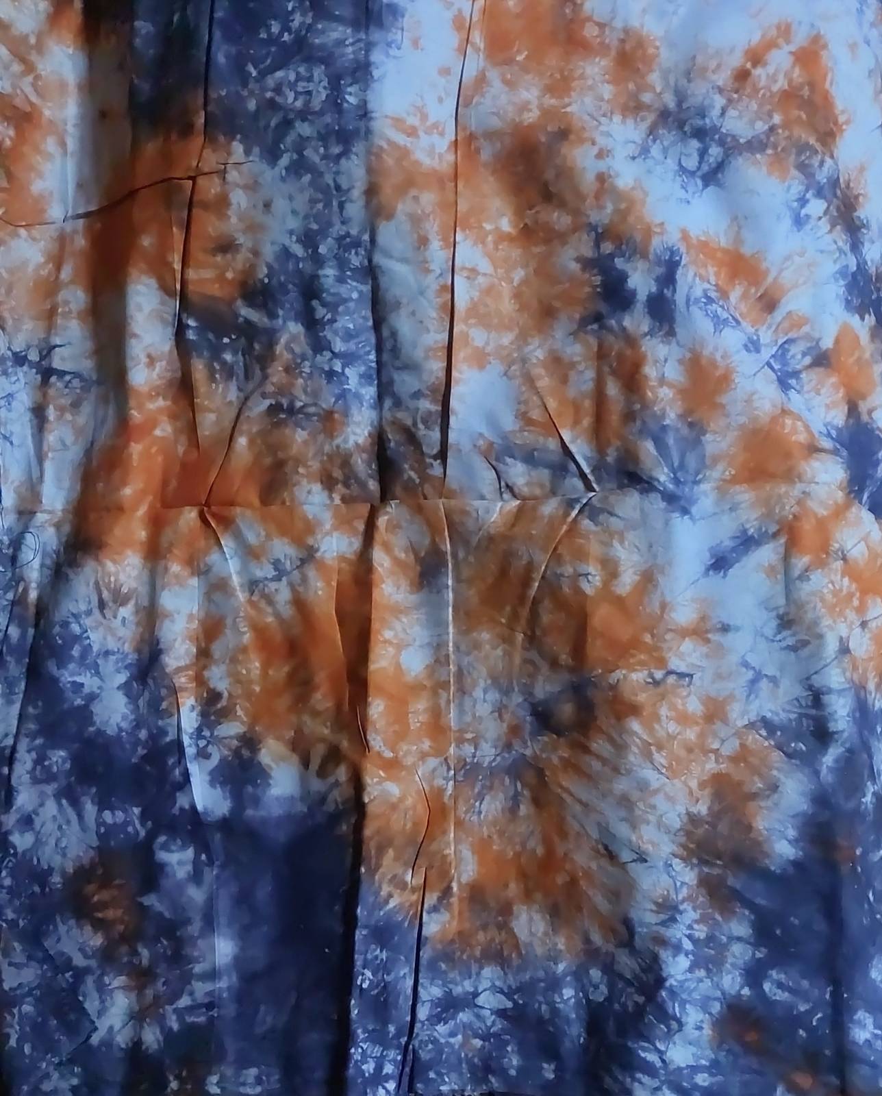 Pagne traditionnel kokodonda tie-dye orange et bleu