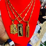 Colliers et pendentifs dorés pour hommes